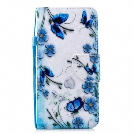 Folio-fodral För iPhone 11 Med Kedjar Fjärilar Och Blommor Med Blå Rem