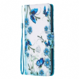 Fodral För Samsung Galaxy A51 5G Med Kedjar Blå Fjärilar Och Blommor Med Rem