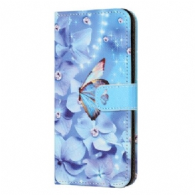 Fodral För Samsung Galaxy S24 Fe Blå Blommor Och Fjärilar Med Rem