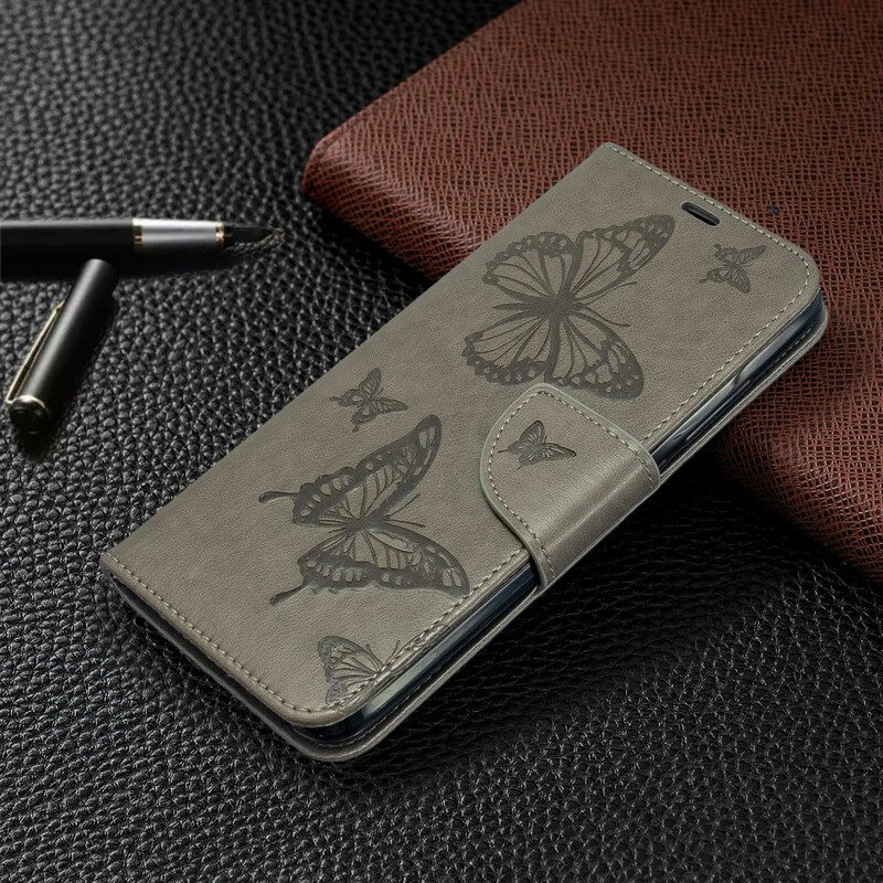 Läderfodral För Xiaomi Redmi 8A Med Kedjar Fjärilar Tryckt Rem