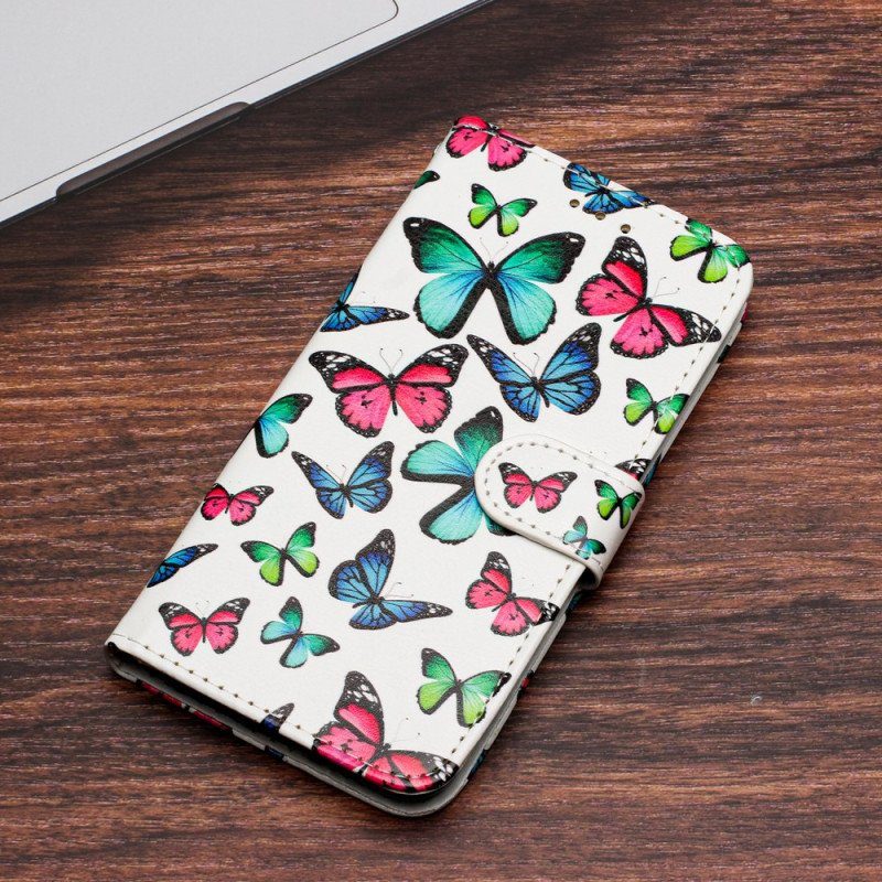 Fodral Xiaomi Redmi A1 Med Kedjar Fjärilar Under Flygning Med Rem